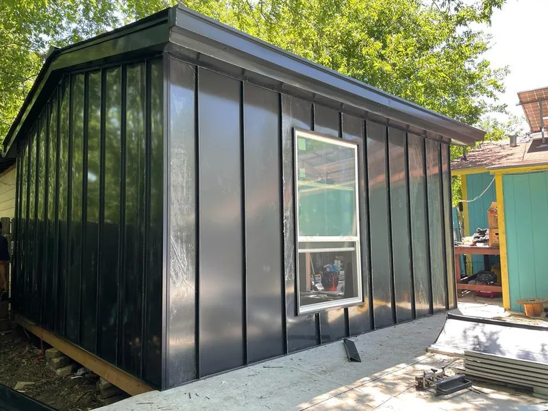 Black standing seam metal wall panels for Metal Roof Installation in Big Spring