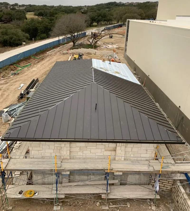 Metal roof new construction with scaffolding in Big Spring